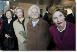 Laura Bush and former first ladies, from left, Rosalynn Carter, Sen. Hillary Clinton, and Barbara Bush attend the dedication ceremony for the William J. Clinton Presidential Center and Park in Little Rock, Ark., Nov. 18, 2004.  White House photo by Eric Draper