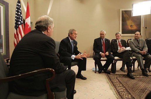 While attending an APEC summit, President George W. Bush participates in a bilateral meeting with Canadian Prime Minister Paul Martin in Santiago, Chile, Nov. 20, 2004. White House photo by Eric Draper