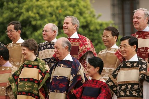 President George W. Bush smiles for a group photo with APEC leaders at La Moneda Presidential Palace in Santiago, Chile, Nov. 21, 2004. White House photo by Paul Morse