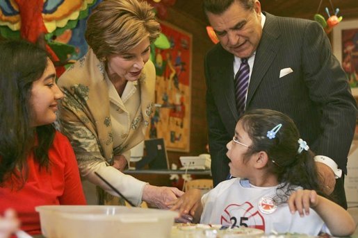 Laura Bush visits children at the Teleton Children's Rehabilitation Center with Chilean television host Mario Kreutzberger, known as Don Francisco, in Santiago, Chile, Nov. 21, 2004. White House photo by Susan Sterner