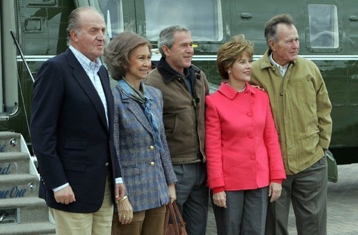 President George W. Bush, Laura Bush, and former President George H.W. Bush welcome Their Majesties King Juan Carlos and Queen Sofia of Spain to the Bush Ranch in Crawford, Texas, Wednesday, Nov. 24, 2004. White House photo by Tina Hager.