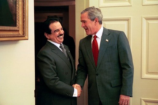 President George W. Bush welcomes His Majesty King Hamad bin Issa Al Khalifa of Bahrain to the Oval Office Monday, Nov. 29, 2004. White House photo by Paul Morse