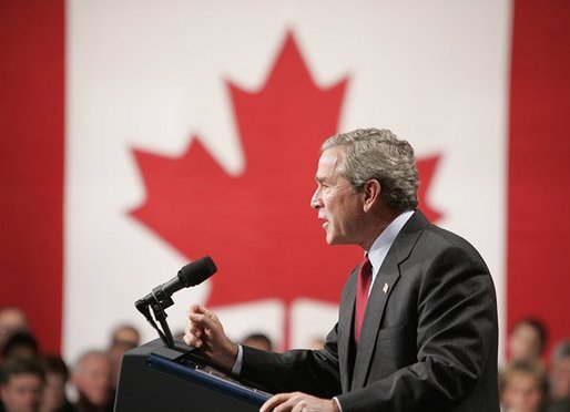 President George W. Bush delivers a speech at Pier 21, Canada's celebrated point of immigration and military deployment, in Halifax, Canada, Dec. 1, 2004. "I'm proud to stand in this historic place, which has welcomed home so many Canadians who defended liberty overseas, and which so many new Canadians began their North American dream," said the President.White House photo by Paul Morse