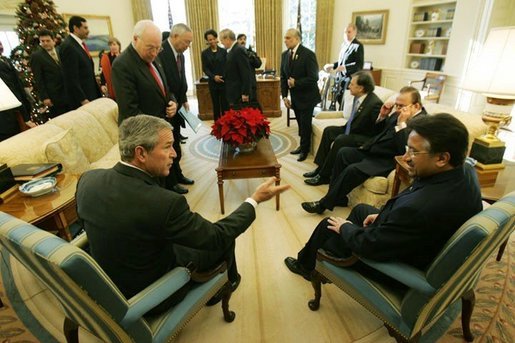 President George W. Bush meets with President Pervez Musharraf of Pakistan Saturday, Dec. 4, 2004 in the Oval Office.White House photo by Tina Hager