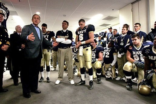 President George W. Bush addresses midshipmen in the Navy locker room before the 105th annual Army/Navy game in Philadelphia, Pa., Dec. 4, 2004. White House photo by Tina Hager