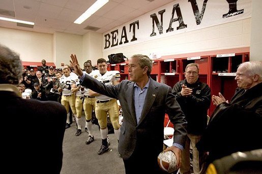President George W. Bush gives a final wave to USMA cadets before the start of the Army/Navy game in Philadelphia, Pa., Dec. 4, 2004. White House photo by Tina Hager