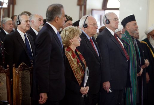 Vice President Dick Cheney and his wife, Lynne, attend the swearing-in ceremony for Afghanistan President Hamid Karzai at Salaam Khana in Kabul, Afghanistan, Dec. 7, 2004. President Karzai is Afghanistan’s first democratically-elected president in Afghanistan's history. Also pictured, from left back, Secretary of Defense Donald Rumsfeld, Afghanistan Vice President Hedayat Amin Arsala, left front; U.S. Ambassador to Afghanistan Zalmay Khalilzad, and Afghanistan President Hamid Karzai, right. White House photo by David Bohrer