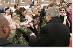 President George W. Bush greets people during a visit to Clinton Township, Mich., Friday, Jan. 7, 2005.  White House photo by Paul Morse