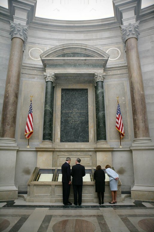President George W. Bush and Laura Bush view the U.S. Constitution with National Archivist John Carlin, second on left, and Senior Curator Stacy Bredhoff, second on right, while touring the National Archives in Washington, D.C., Wednesday, Jan. 19, 2005. The Bushes also looked at the Declaration of Independence, George Washington's handwritten inaugural address, George Washington and President George H. W. Bush's inaugural Bible, and the Bill of Rights. White House photo by Eric Draper