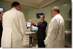 President George W. Bush gets a demonstration on health care information technology by doctors of the Cleveland Clinic in Cleveland, Ohio, Thursday, Jan. 27, 2005.  White House photo by Paul Morse