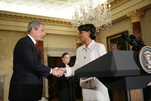President Bush shakes hands with Dr. Condoleezza Rice after introducing her those in attendence for her ceremonial swearing-in at the U.S. Department of State Friday, Jan. 28, 2005. White House photo by Eric Draper