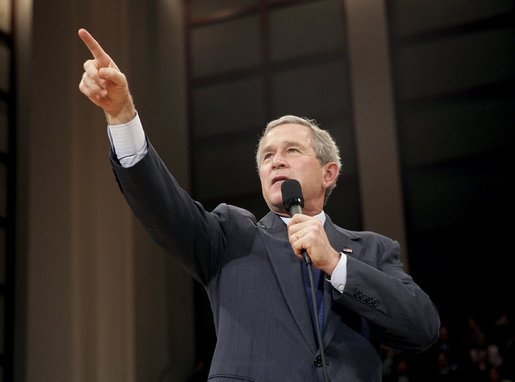 President George W. Bush acknowledges members of the audience during his Town Hall meeting on strengthening Social Security in Raleigh, N.C., Thursday, Feb. 10, 2005. White House photo by Eric Draper