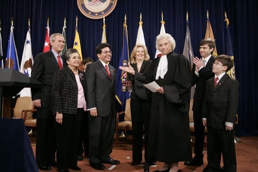 Justice Sandra Day O'Connor introduces Alberto Gonzales to the audience after administering the oath of office to him during ceremonies welcoming him to his new post of U.S. Attorney General. Joining President George W. Bush in the proceedings are members of Mr. Gonzales' family. White House photo by Paul Morse.