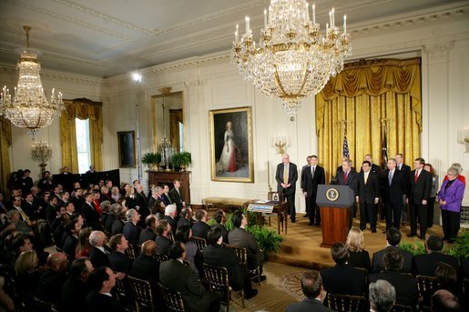 President George W. Bush discusses the Class Action Fairness Act of 2004 during a ceremony in the East Room before signing the act into law, Friday, Feb. 18, 2005. White House photo by Eric Draper