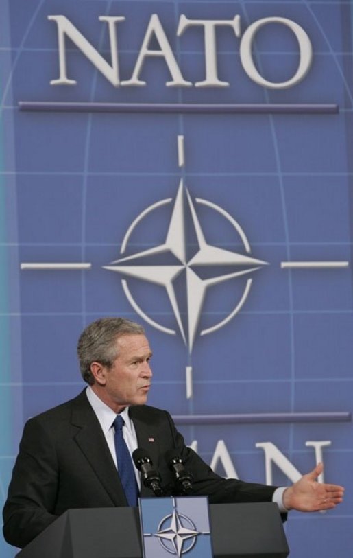President George W. Bush speaks during a joint news conference with NATO Secretary General Jaap de Hoop Scheffer at NATO Headquarters in Brussels, Tuesday, Feb. 22, 2005. White House photo by Paul Morse