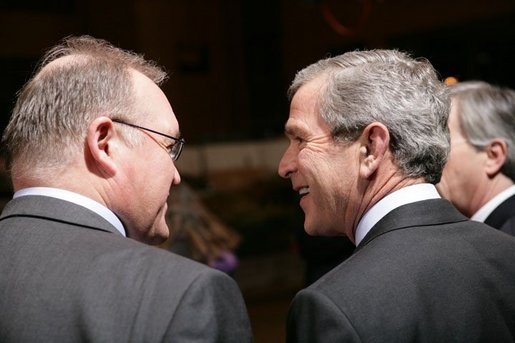 President George W. Bush shares a light moment with Sweden's Prime Minister Goeran Persson Tuesday, Feb. 22, 2005, during European Summit talks in Brussels. White House photo by Eric Draper