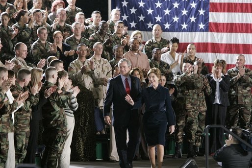 During a Feb. 23, 2005, visit to Wiesbaden Army Air Field in Wiesbaden, Germany, President George W. Bush and Laura Bush are welcomed by applause from U.S. troops. White House photo by Paul Morse
