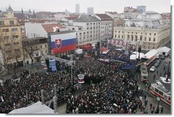 President George W. Bush and Slovakia’s Prime Minister Mikulas Dzurinda are greeted by a crowd of thousands gathered in Bratislava's Hviezdoslavovo Square, February 24, 2005.  White House photo by Paul Morse