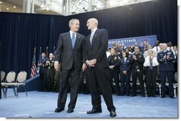 President George W. Bush stands with new U.S. Secretary of Homeland Security Michael Chertoff during Chertoff’s swearing-in ceremony Thursday, Mar. 3, 2005, at the Ronald Reagan Building and International Trade Center in Washington, D.C.  White House photo by Paul Morse