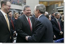 President George W. Bush greets former Attorney General John Ashcroft after the swearing-in ceremony Thursday, March 3, 2005, of Michael Chertoff as new Homeland Security chief. The event took place at the Ronald Reagan Building and International Trade Center in Washington, D.C.  White House photo by Paul Morse