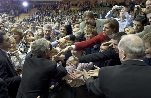 President George W. Bush greets the crowd after a conversation on strengthening Social Security on the University of Notre Dame campus in South Bend, Indiana on Friday, March 4, 2005. White House photo by Paul Morse