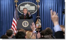 President George W. Bush calls on reporters during his press conference in the James S. Brady Press Briefing Room at the White House Wednesday, March 16, 2005.  White House photo by Paul Morse