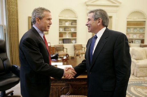 President George W. Bush welcomes Deputy Secretary of Defense Paul Wolfowitz to the Oval Office Wednesday, March 16, 2005. President Bush is recommending Secretary Wolfowitz to be elected as the next President of the World Bank. White House photo by Paul Morse