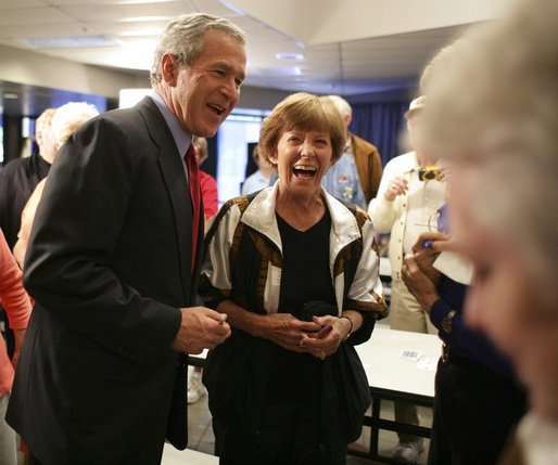 President George W. Bush shares a light moment with seniors at Tucson’s Morris K. Udall Center during his early morning visit Monday, March 21, 2005. The president made the recreational center his first Arizona stop and spoke to seniors there about his plans for strengthening Social Security. White House photo by Eric Draper