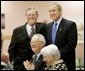 President George W. Bush and Senator Pete Domenici, R-NM., visit with breakfast guests at Bear Canyon Senior Center, Tuesday, March 22, 2005, in Albuquerque. The two visited with more than 30 seniors who were on hand to hear the presidents proposals for Social Security reform.  White House photo by Eric Draper