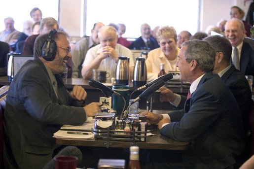 President George W. Bush and Sen. Chuck Grassley, R-Iowa, participate in an interview with radio talk show host Jan Mickelson at the Spring House Family Restaurant in Cedar Rapids, Iowa, March 30, 2005. White House photo by Paul Morse