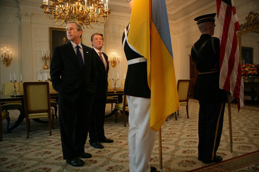 President George W. Bush and Ukraine President Viktor Yushchenko wait for the start of a press availability during Mr. Yushchenko's visit Monday, April 4, 2005, to the White House.White House photo by Eric Draper