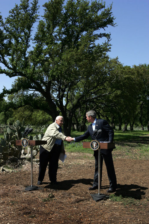 Israeli Prime Minister Ariel Sharon and President George W. Bush shake hands during a press conference at the President's Ranch in Crawford, Texas, Monday, April 11, 2005. White House photo by David Bohrer
