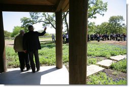 President George W. Bush and Israeli Prime Minister Ariel Sharon wave to the press while meeting at the President's Ranch in Crawford, Texas, Monday, April 11, 2005. White House photo by David Bohrer