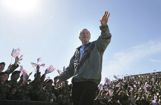 President George W. Bush receives a rousing Fort Hood welcome Tuesday, April 12, 2005, as he arrived at the base to thank the troops for their service and sacrifice in Iraq. "Whether you're coming or going, you are making an enormous difference for the security of our nation and for the peace of the world," the President said. White House photo by Eric Draper