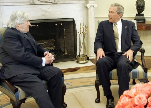 President George W. Bush meets with James Wolfensohn, the outgoing president of the World Bank Thursday, April 14, 2005, in the Oval Office of the White House. White House photo by Paul Morse