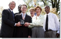 President and Mrs. Bush stand with Jason Kamras, the 2005 National Teacher of the Year, after he was honored during ceremonies in the Rose Garden Wednesday, April 20, 2005. Joining them are Secretary of Education Margaret Spellings and former students Wendall Jefferson, left, and Marco Jeter.  White House photo by Eric Draper