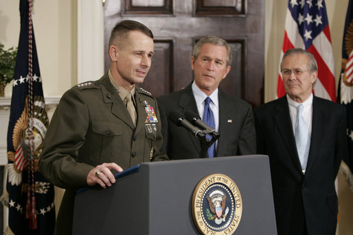 Gen. Peter Pace addresses the media as President George W. Bush and Secretary of Defense Donald Rumsfeld look on Friday, April 22, 2005. The President announced his nomination of Gen. Pace to be Chairman of the Joint Chiefs of Staff, saying, "When confirmed by the Senate, General Pete Pace will be the first Marine in history to hold this vital position. He knows the job well." White House photo by Paul Morse