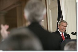 President George W. Bush listens to a reporter's question during a press conference in the East Room Thursday, April 28, 2005.  White House photo by Eric Draper