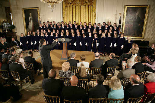 The St. Olaf Choir, led by Anton Armstrong, performs during the commemoration of the National Day of Prayer commemoration in the East Room Thursday, May 5, 2005. White House photo by Eric Draper