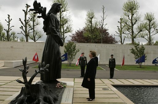 First Lady Laura Bush reflects after placing flowers at the Mourning Woman Statue in Netherlands American Cemetery Sunday, May 8, 2005, in Margraten. White House photo by Krisanne Johnson