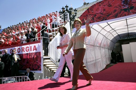 Laura Bush and Sandra Roelofs, wife of Georgian President Mikhail Saakashvili, are introduced before President Bush addresses a crowd of thousands at Freedom Square in Tbilisi, Georgia, Tuesday, May 10, 2005. White House photo by Eric Draper