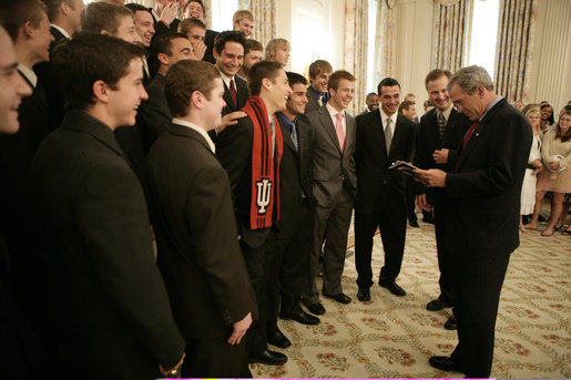 President George W. Bush talks with members of the Indiana University men's soccer team in the State Dining Room before a ceremony celebrating the 2005 NCAA champions Friday, May 13, 2005. White House photo by Eric Draper