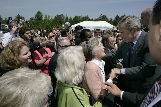 President George W. Bush meets some of the audience members at West Point, Va., Monday, May 16, 2005.White House photo by Eric Draper