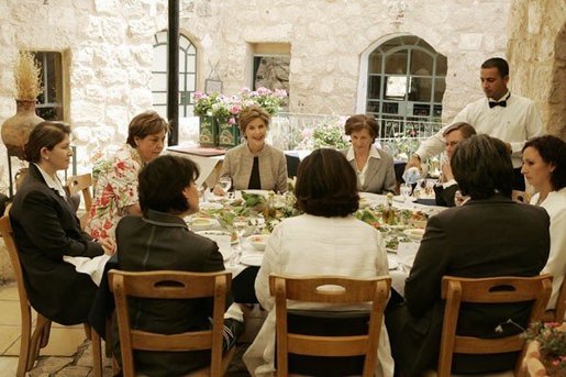 Laura Bush discusses the role of women in Jordan’s reform movement with Jordanian women leaders during lunch at the Haret Jdouna restaurant in Medaba, Jordan, Saturday, May 21, 2005. White House photo by Krisanne Johnson