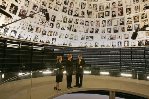 Laura Bush tours the Hall of Names with Gila Katsav, wife of President Moshe Katsav of Israel, left, and General Avner Shalev, chairman of the Yad Vashem Directorate, right, at the Yad Vashem Holocaust museum in Jerusalem, Sunday, May 22, 2005. The Hall of Names is a repository of testimony from millions of Holocaust victims and serves as a memorial to those who died. White House photo by Krisanne Johnson