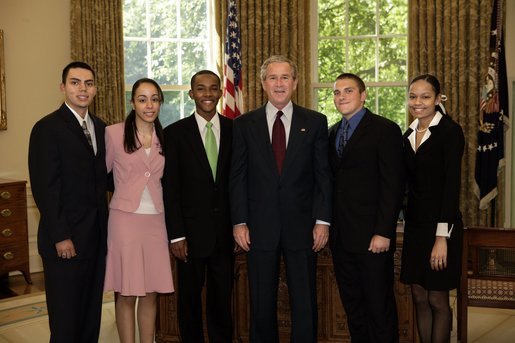 President George W. Bush stands with the 2004 Boys & Girls Club of America's Youth of the Year finalists in the Oval Office Wednesday, June 1, 2005. From left are: Ramon Moran of Tucson, Ariz.; Noelia Bare of Lawrence, Mass.; Stephen Miller of Mobile, Ala.; President Bush; Thomas "T.J." Rancour of Bay County, Mich., and Danielle Snead of San Antonio. White House photo by Eric Draper