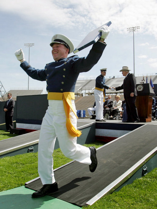 A cadet celebrates after receiving his diploma from the U.S. Air Force Academy in Colorado on Wednesday, June 1, 2005. Vice President Dick Cheney delivered the commencement address and personally congratulated the newly-commissioned officers. White House photo by David Bohrer