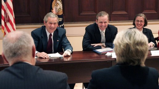 President George W. Bush, joined by Dan Bartlett, Counselor to the President, meets with members of the Radio-Television News Directors Association for a roundtable discussion Wednesday, June 1, 2005, at the Eisenhower Executive Office Building. White House photo by Paul Morse