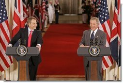 President George W. Bush and British Prime Minister Tony Blair hold a joint press conference in the East Room Tuesday, June 7, 2005. "Prime Minister Blair and I share a common vision of a world that is free, prosperous, and at peace," said President Bush. "When men and women are free to choose their own governments, to speak their minds, and to pursue a good life for their families, they build a strong, prosperous and just society."  White House photo by Paul Morse