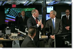 President George W. Bush tours the National Counterterrorism Center in McLean, Va., Friday, June 10, 2005. "I just met with some (of the men and women) who spend long hours preparing threat assessments, and it was my honor to tell them how much I appreciate their hard work and appreciate the daily briefing I get every single morning," said the President in his remarks after the tour.  White House photo by Eric Draper